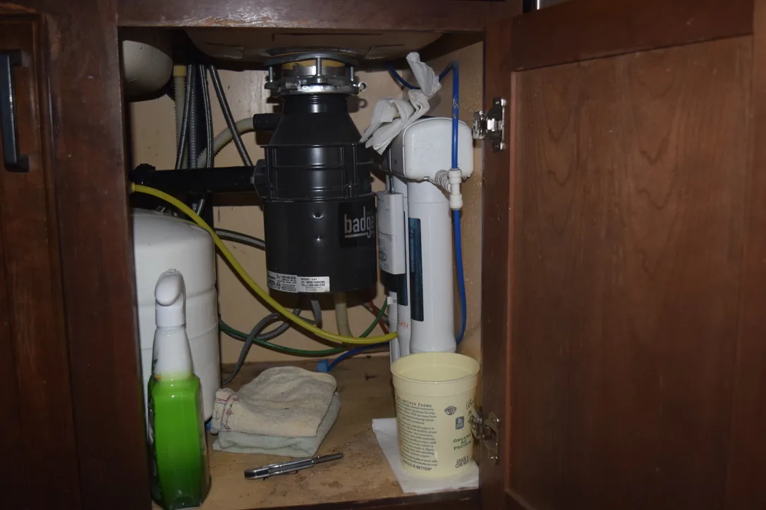 Under-sink plumbing diagnostic and service project